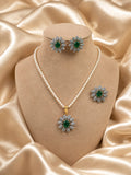 Green pendant set with studs and ring