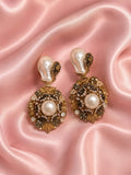 White pearl earrings